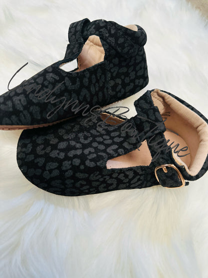Black leopard T bar shoes