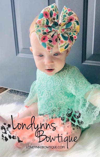 Colorful floral headwrap bow